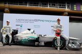 Michael Schumacher and Nico Rosberg. Presentation Formula 1 2011 Mercedes GP PETRONAS MGP W02 (Launch). F1 wallpaper 2011 (HIGH RESOLUTION PHOTO) Michael Schumacher and Nico Rosberg. Presentation Formula 1 2011 Mercedes GP PETRONAS MGP W02. F1 wallpaper 2011 (HIGH RESOLUTION PHOTO)